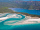 Whitehaven Beach : une image de la plage avec son sable blanc et ses eaux turquoise.